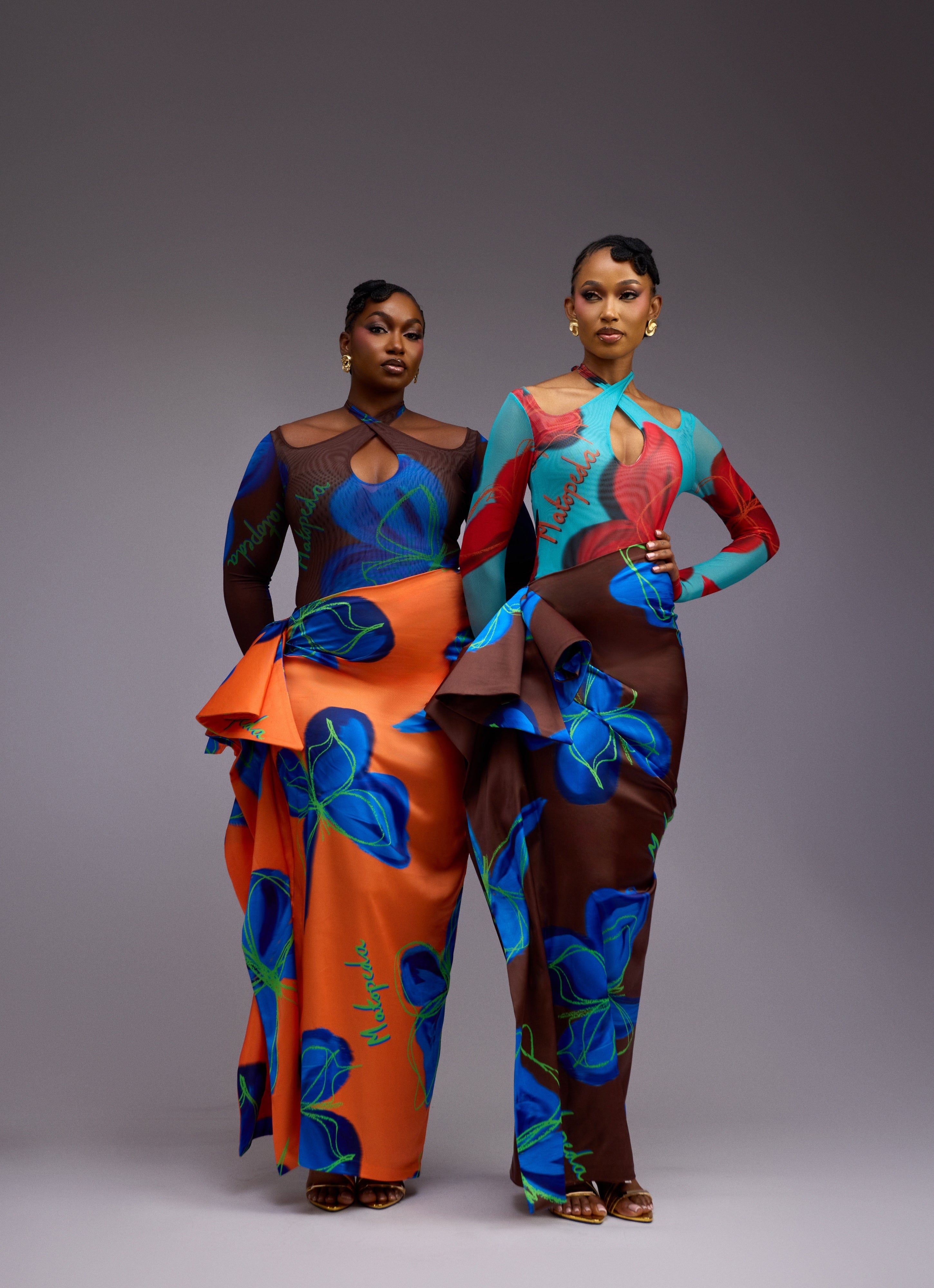 BUTTERFLY PRINT SATIN SKIRT - ORANGE